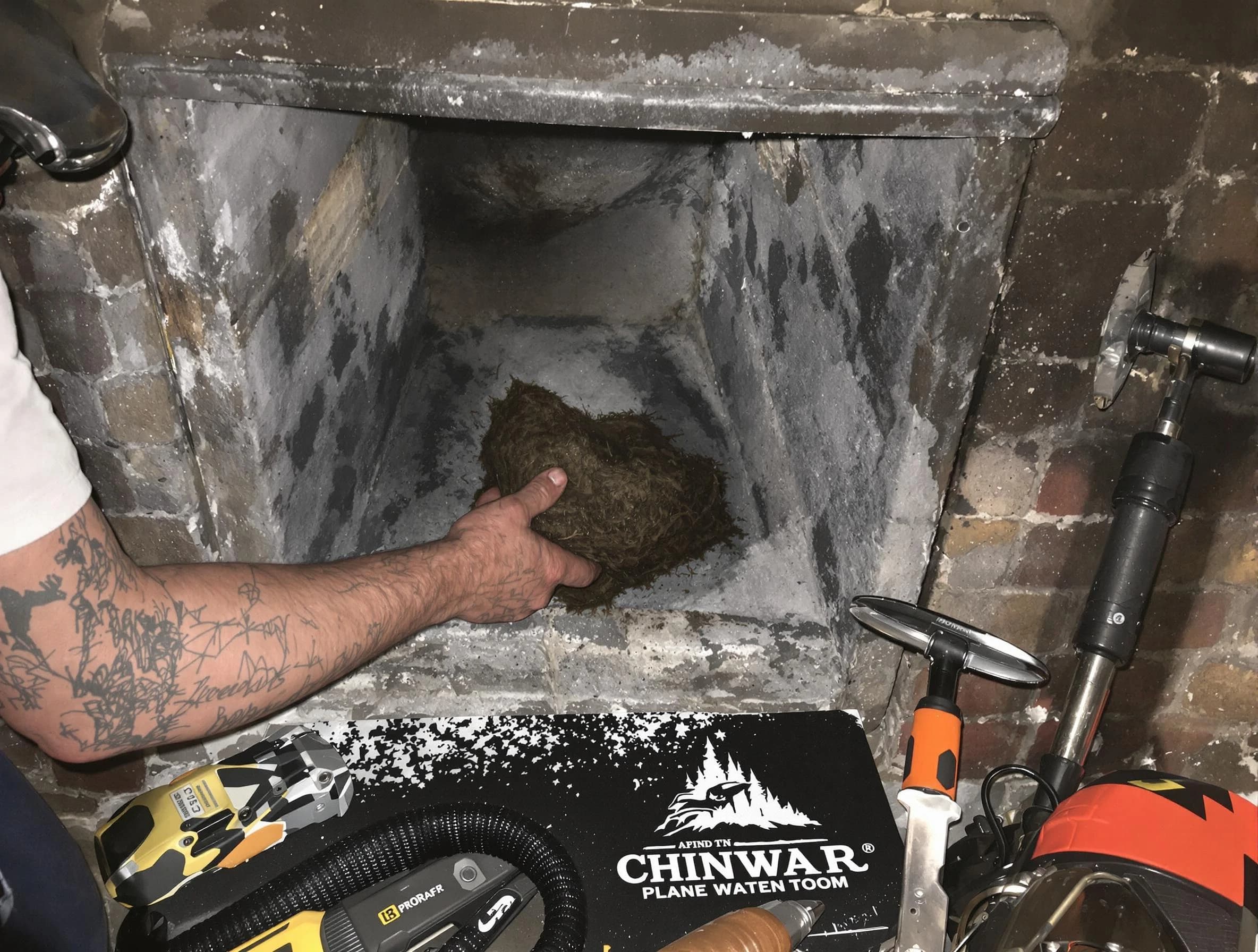 Clay Chimney Sweep safely removing debris and screening chimney in Clay, AL